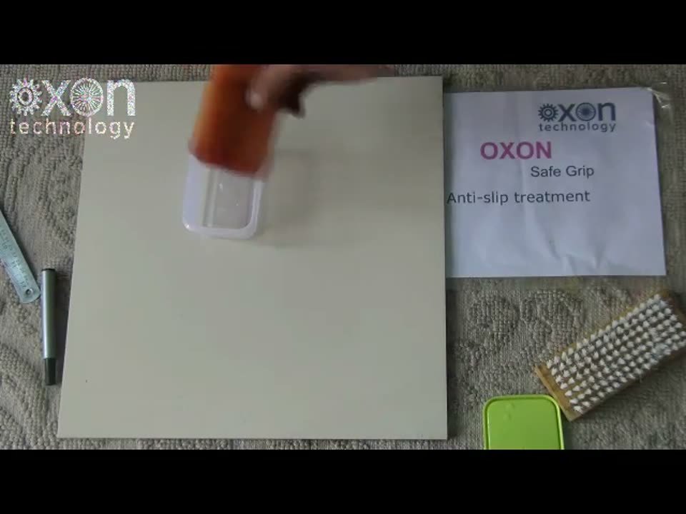 Oxon Safe Grip being applied to a sample tile